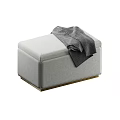 Modern Gray Fabric Ottoman with Gold Base and Gray Blanket on Top