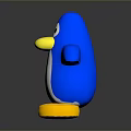 Blue Penguin Toy With Yellow Beak Feet White Belly And Outstretched Arms On Gray Background