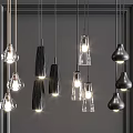 Modern Pendant Lights With Glass And Matte Black Designs Illuminating Grey Background