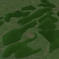 Green Wavy Landforms In Park Landscape With Lush Grass And Sculptural Hills