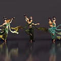 Three Female Dancers In Green Traditional Costumes Performing With Musical Instruments And Floating Sleeves