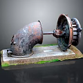 Old Rusted Electronic Device Parts Displayed on Mossy Industrial Base Stand