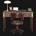 Dark Wooden Desk With Green Top Lamp Photo Frame Notebook Stacked Books And Leather Chair