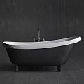 Modern Freestanding Bathtub With Black And White Design And Metal Faucet On Gray Wall Background