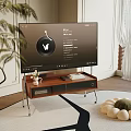 Modern Smart TV on Wooden Stand in Living Room with Vase Books and Decorative Elements