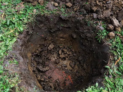 Garden Landscape Excavated Hole Surrounded by Soil Stones and Green Grass on Ground 3d model