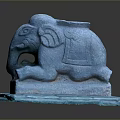 Blue Reclining Elephant Sculpture With Intricate Carved Details And Sturdy Base