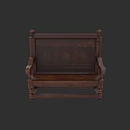 Dark Wood Carved Bench With Ornate Backrest Armrests And Decorative Details
