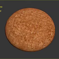 Round Orange Baked Pastry With Speckled Sugar Topping On Surface