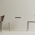 Two Modern Versace Leisure Chairs With Stylish Design And Neutral Backdrop 3d model