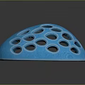 Blue Weapon With Multiple Circular Holes And Helmet Like Protective Structure