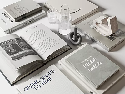 Open Books With Text And Decorative Items On Modern Table Top 3d model