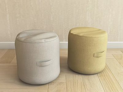 Two Round Fabric Ottomans in Light Gray and Beige on Wooden Floor 3d model