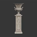 White Classical Carved Pedestal Column With Intricate Details And Decorative Vase Top