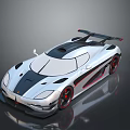 Silver And Black Sports Car With Rear Wing Red Wheels And Sleek Design