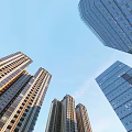 Modern High Rise Office Buildings With Glass Facades Under Blue Sky