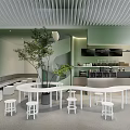 Modern Cafe Interior Design With Green Walls White Tables Chairs And Indoor Plants