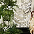 Elegant Wedding Decoration With White Drapes Hanging Ornaments Green Plants And Flowers