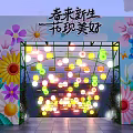 Floral Decor Archway With Colorful Lanterns Illuminated Lights Green Plants And Brick Pathway