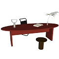 Red Oval Desk With Table Lamp Open Book Plant Vase Chair And Small Stool
