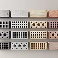 Different Colored Construction Bricks With Square Round And Grid Hole Patterns