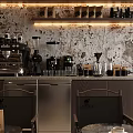Cozy Café Interior With Coffee Machine Beans On Rustic Textured Wall Shelves And Tables