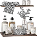 Daily Washing Essentials With Pump Bottles Candles Towels Eucalyptus And Wooden Shelf