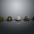 Five Colored Hats With Various Designs And Red Brims On Gray Background