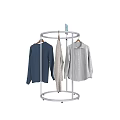 Clothes Including Long Sleeve Top Striped Sweater And Shirt Hanging On White Metal Round Rack