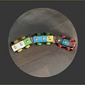 Colorful Wooden Toy Train on Round Wooden Table with Multicolored Wheels