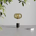 Modern Amber Glass Table Lamp With Brass Stand Black Marble Base And Green Leaves