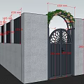 Black Arched Gate With Circular Lattice Design Green Plants Red Flowers And White Walls