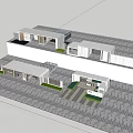 Modern Entrance Gate with Building Exterior Lush Trees Driveway and Parked Cars