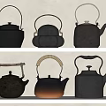 Collection of Six Black Tea Kettles with Various Designs and Different Handles Including Gradient Color