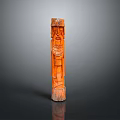 Natural Landscape With Orange Wooden Totem Pole Carved Faces And Patterns