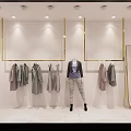 Minimalism Style Clothing Store With Clothing Racks Pink Chair Marble Counter And Chandeliers