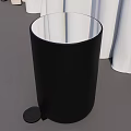 Black Cylindrical Trash Can With Pedal White Fabric Background And Gray Floor