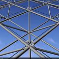 White Geometric Grid Structure As Architectural Roof Component With Sky Background