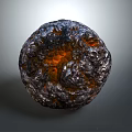 Natural Wood And Stone Spherical Decor With Textured Dark Exterior And Orange Center