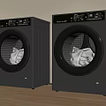 Two Modern Silver Front Loading Washing Machines With Control Panels On Wooden Floor