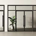 Modern Black Frame Glass Double Doors In Interior With Green Plant