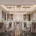 Elegant Banquet Hall With Decorated Tables Bow Ties On Chairs Flower Arrangements And Crystal Chandeliers