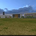 Primary School Building Modern White And Yellow Exterior With Large Windows Lawn And Campus Road