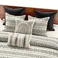 Modern Wooden Double Bed With Gray Beige Geometric Striped Bedding And Pillows