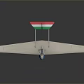White Model Airplane With Long Wings Red Green Tail And Blue Cockpit
