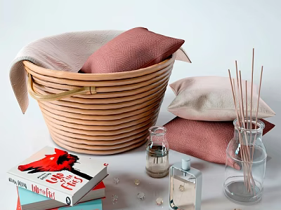 Woven Storage Basket with Pink Beige Pillows beside Books Scented Sticks Fragrance Bottles Small Decor 3d model