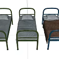 Three Single Beds With Metal Frames Gray Mattresses White Pillows And Brown Blanket