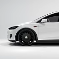 White Tesla Model X Electric SUV With Black Wheels And Modern Exterior Design