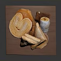 Freshly Baked Flaky Pastry Snacks Triangular and Rolled Arranged on Wooden Tray