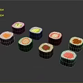 Assorted Sushi Rolls With Fresh Vegetables And Colorful Fillings On Black Background